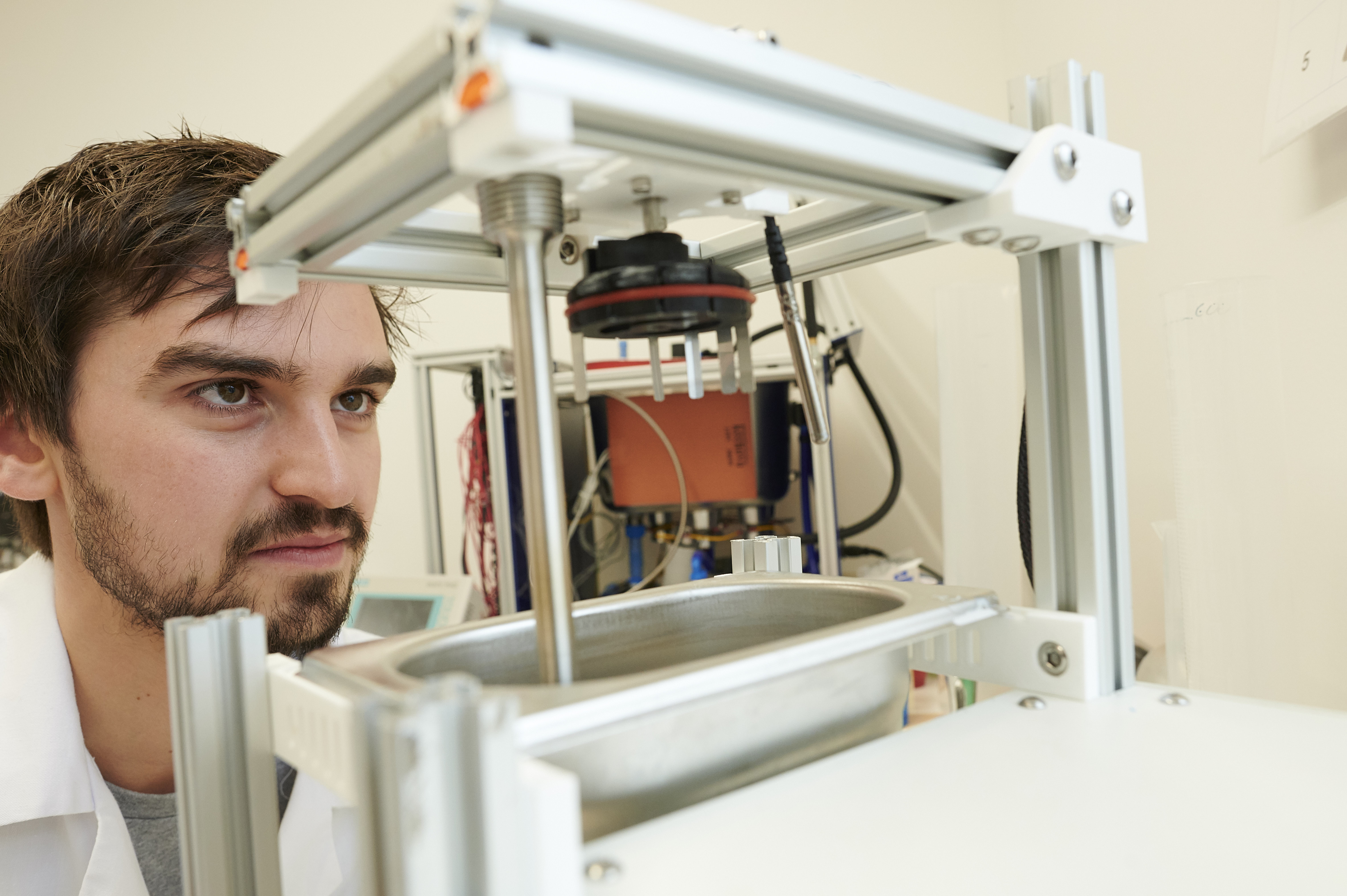 member of Aseptium team examines kit in the lab